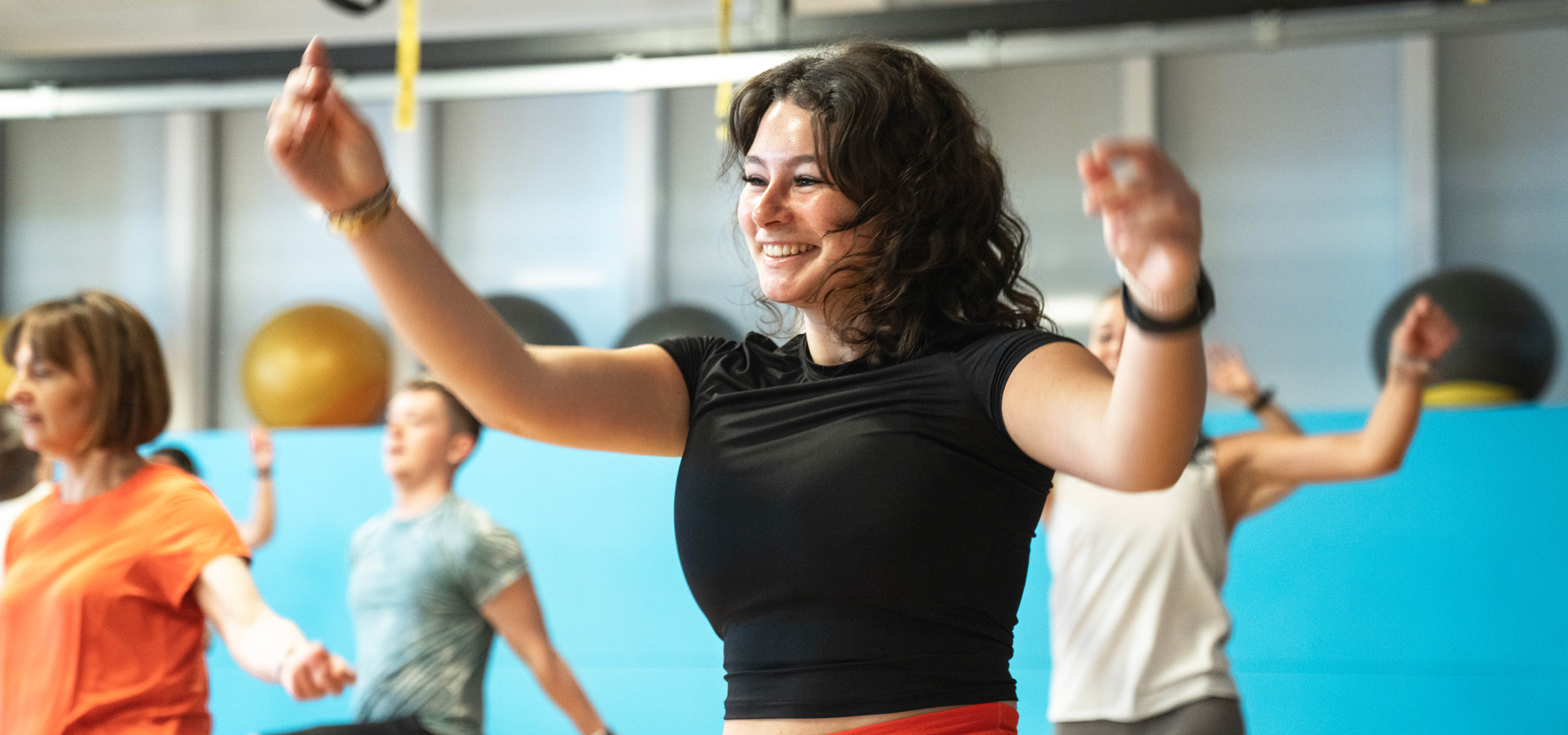 Female student taking part in a dance class