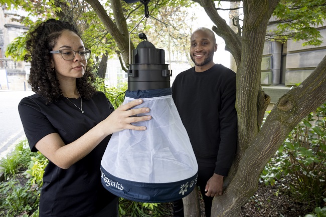 University of Glasgow researchers launching a citizen science tool to research mosquitos in Scotland. Pictured L to R Dr Georgia Kirby and PhD student Meshach Lee with the mosquito trap.