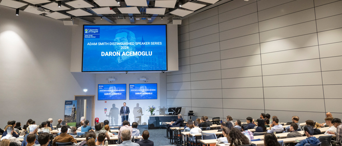 Professor Daron Acemoglu delivering a lecture