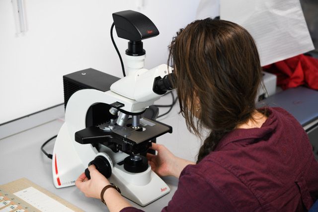 woman at microscope
