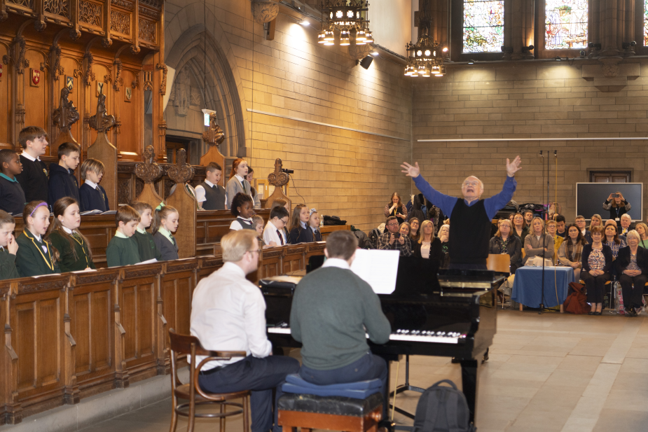 John Rutter conducting Primary School children