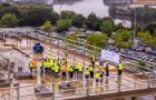 Representatives gathered at a building site