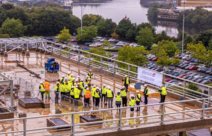 Representatives gathered at a building site