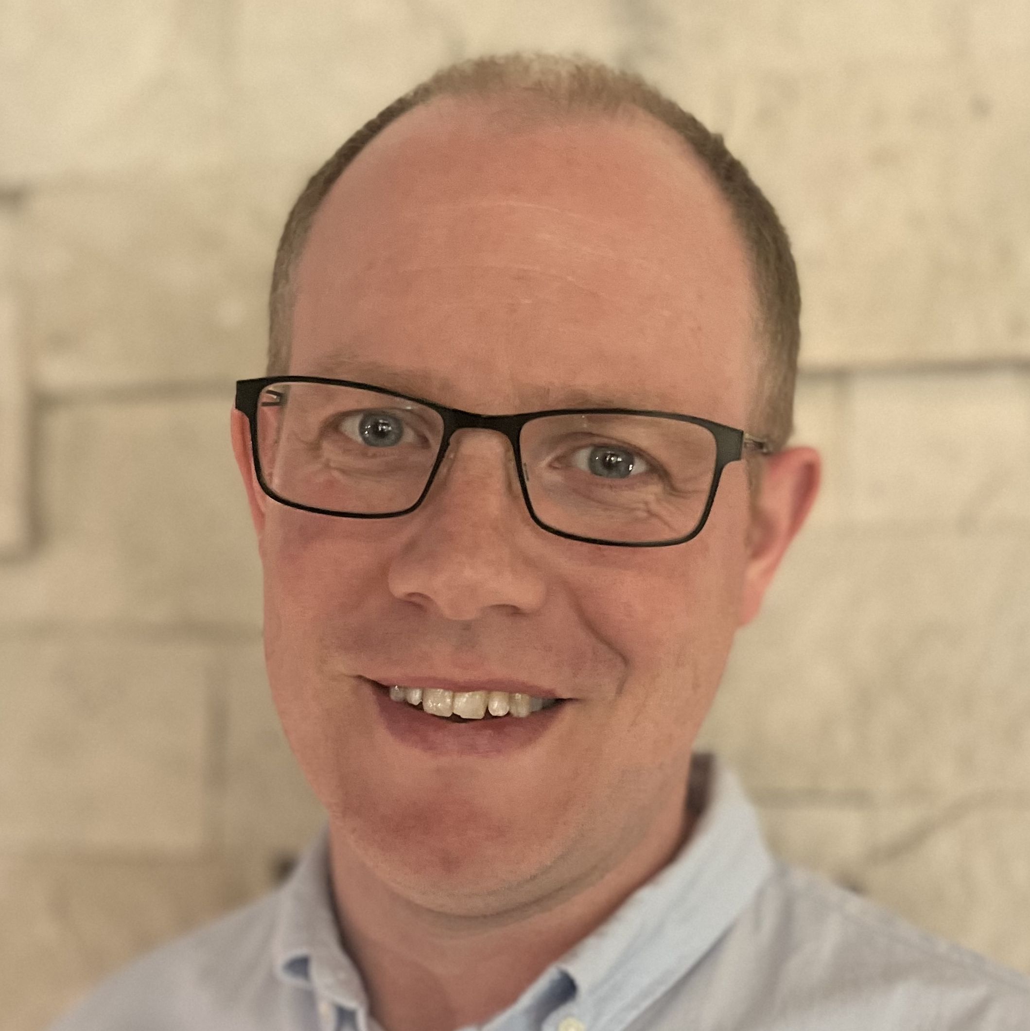 An headshot of Ross Forgan