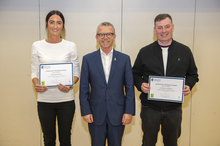 staff receiving certificates