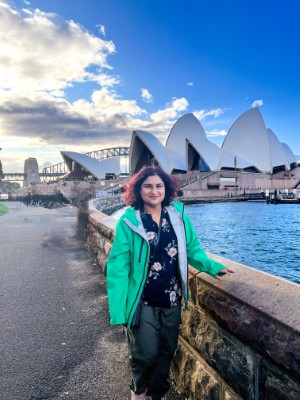 Naaz Sibia standing in front of the Sydney Opera House