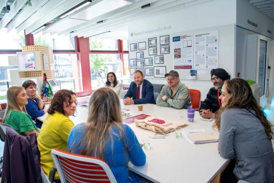 Ian Murray MP with University and community members sitting round table in Byres