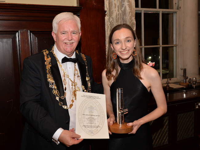 Deacon Raymond Lyon of the Incorporation of Hammermen of Glasgow presents Lisa Chestnutt with the Prince Philip Prize. Photo courtesy of George Mahoney.