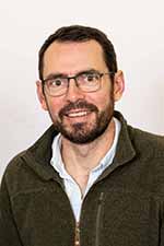 Headshot image of Dr Thomas Morrison