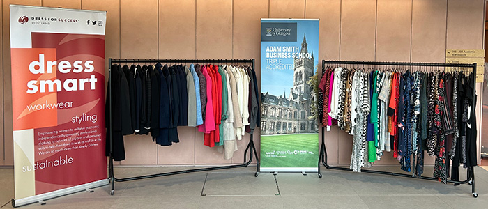 Banner stands and clothes rails in the atrium of the Adam Smith Building