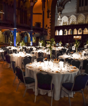 Bute Hall set out with round dining tables ready for celebration dinner