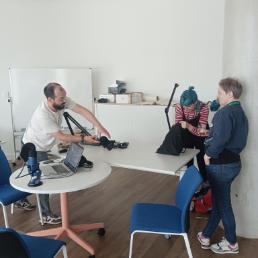 Participants and Researchers at podcast workshop