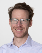 A head and shoulders portrait shot of Dr Gareth-Rhys Jones