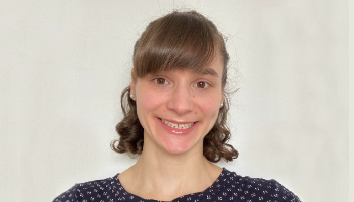 A head and shoulders portrait shot of Dr Arianne Babina