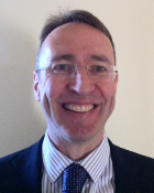 A head and shoulders portrait shot of Professor David Wilson
