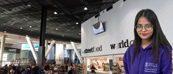 View inside of catering in the JMS building with headshot of smiling woman