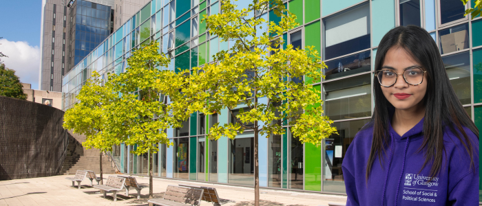 Exterior of the Fraser Building with headshot of smiling woman