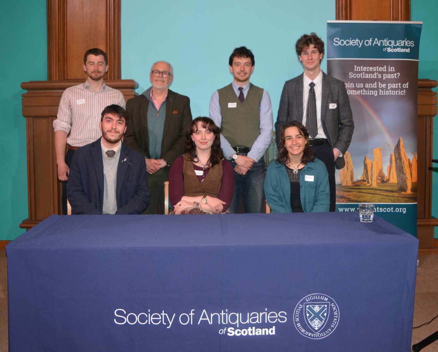 The Govan Old Team Top: Rob Ferro, Prof Stephen Driscoll, Luca McCall, Alexander McClure. Seated: Michael Hogg, Rachel McDonald, Moira Piazzoli. (Image: Miller 2025)