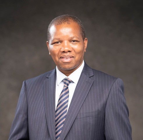 Smiling headshot of Dr Mawpatsa Mipando