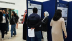 Staff and students peruse the poster boards on display at the Sii PGR Poster Day 2025