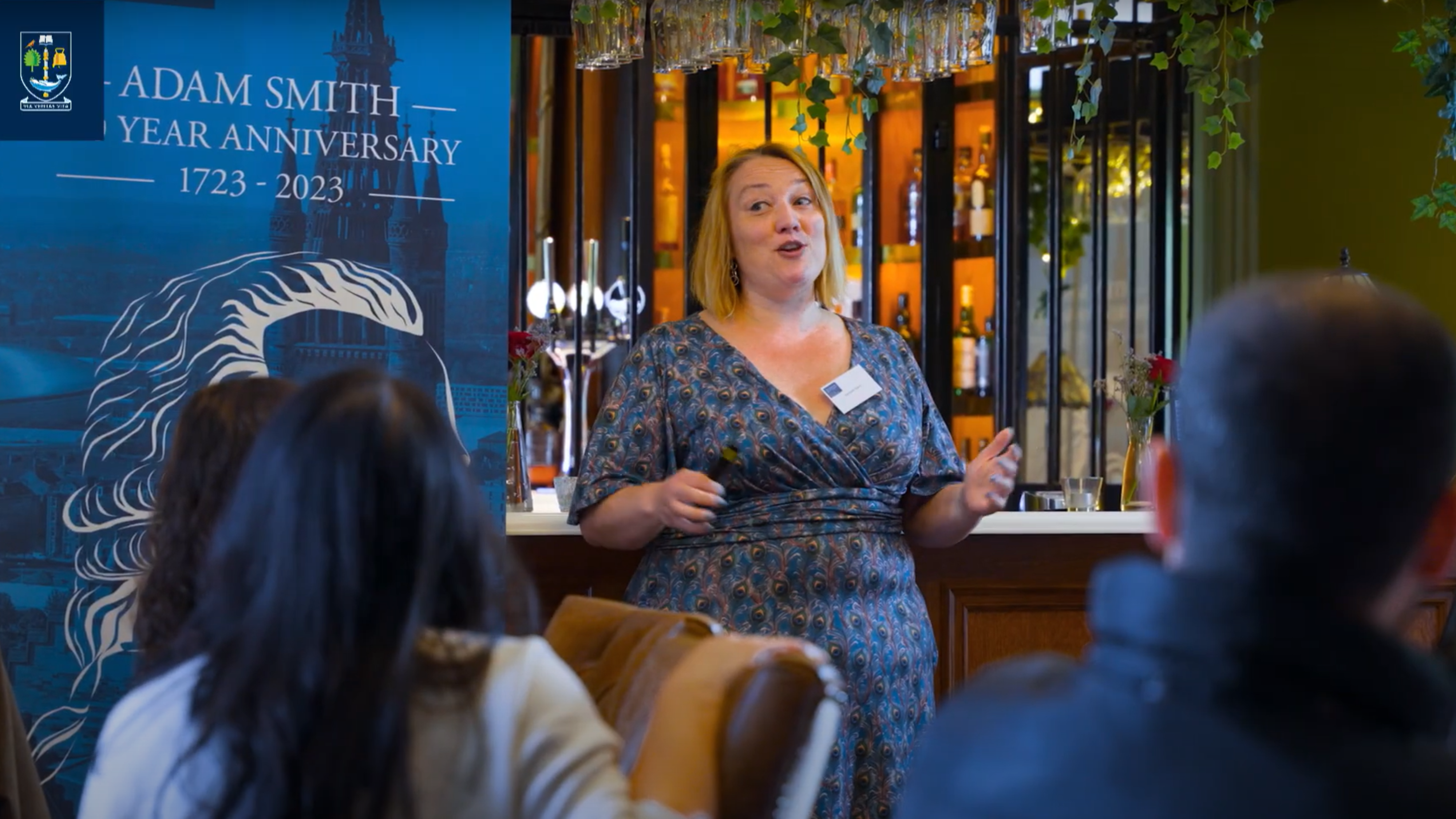 Photo of Professor Kat Riach during presentation