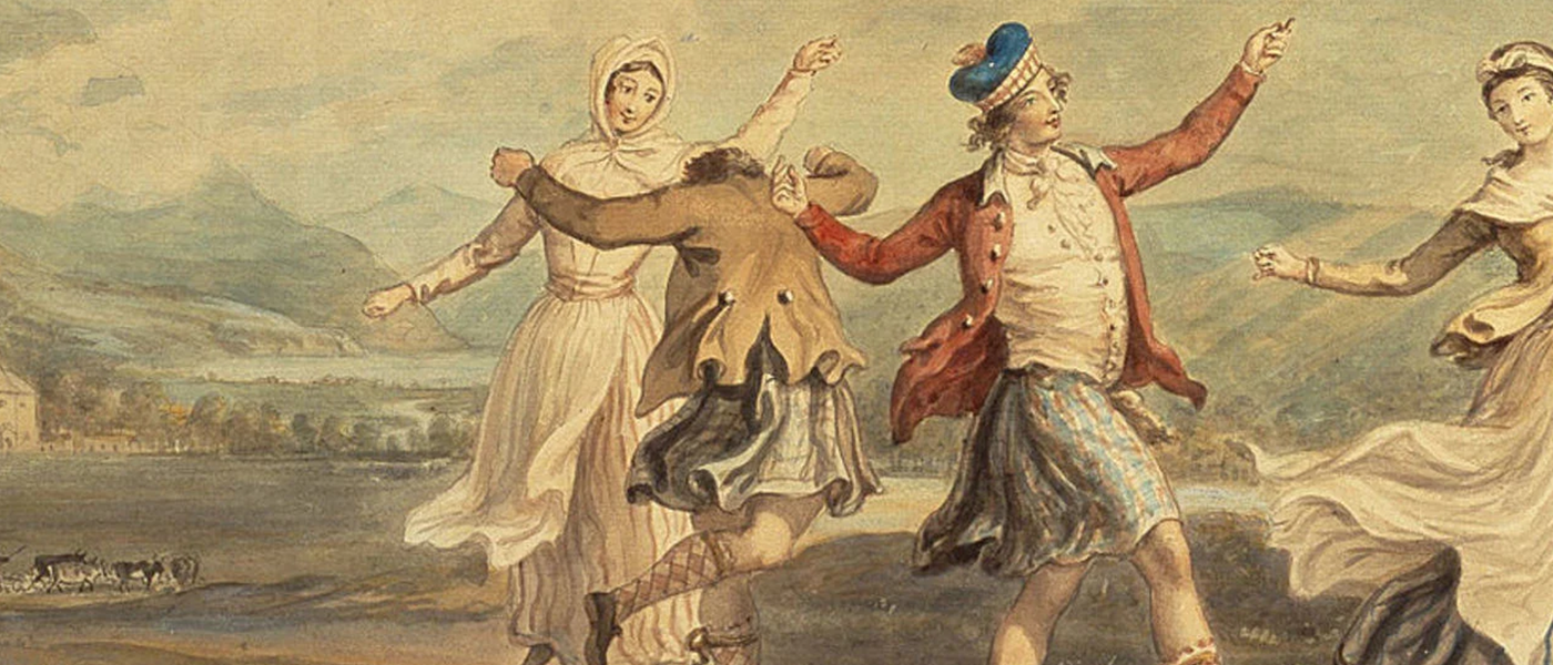 Clansmen and women dancing in a field