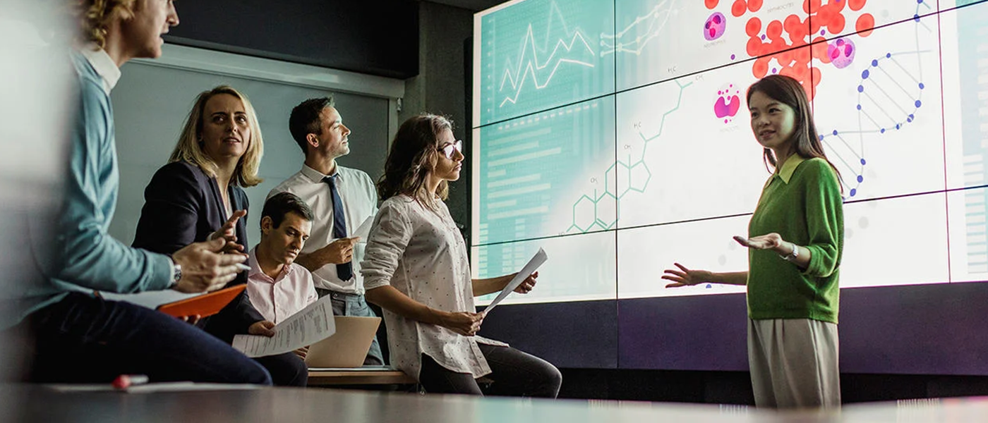 People looking at a presentation on a screen