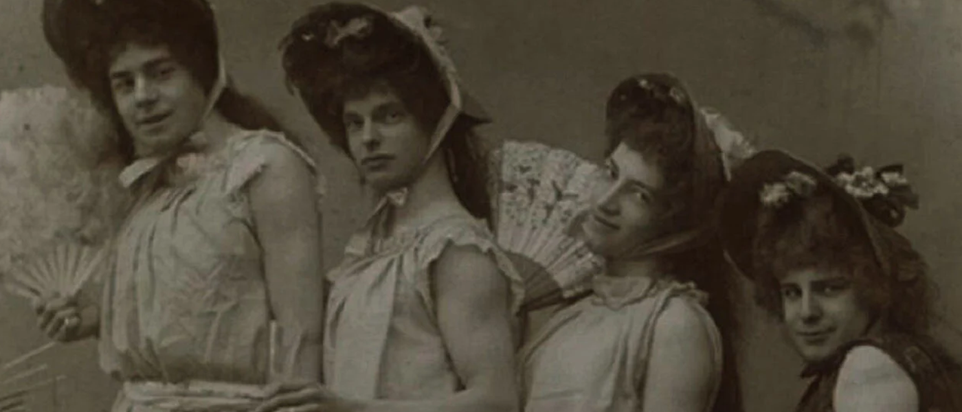 A historical picture of men dressed in female clothing