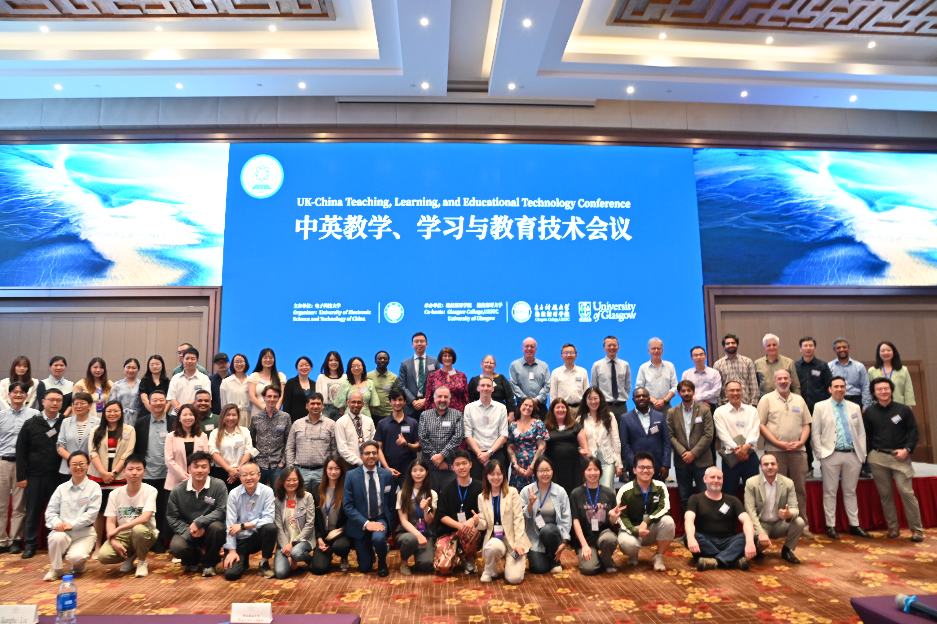 An image of the attendees of TILE TEC 2025 on front of the presenting stage.