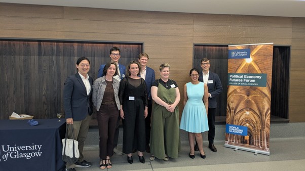 The PEFF co-leads, keynote speakers, and Dean of Research of the College of Social Sciences at the PEFF Symposium. From left to right: Mingzhe Zhu, Judith Clifton, Bernhard Reinsberg, Franziska Paul, Guy Arnold, Mel Simms, Maha Rafi Atal, Sean Vanatta.