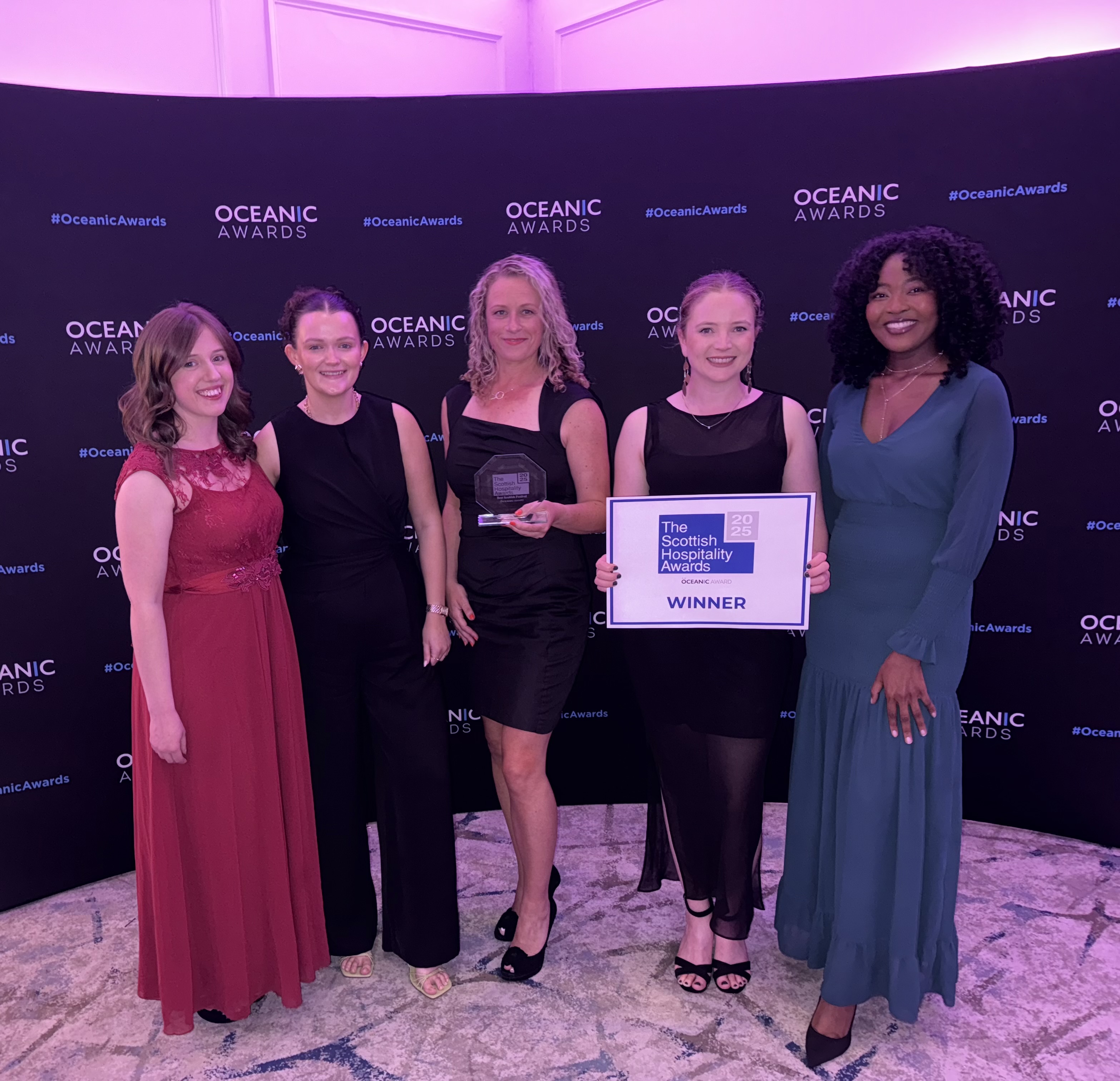 Photograph os the GSF team holding the award for Best Scottish Festival 2025.