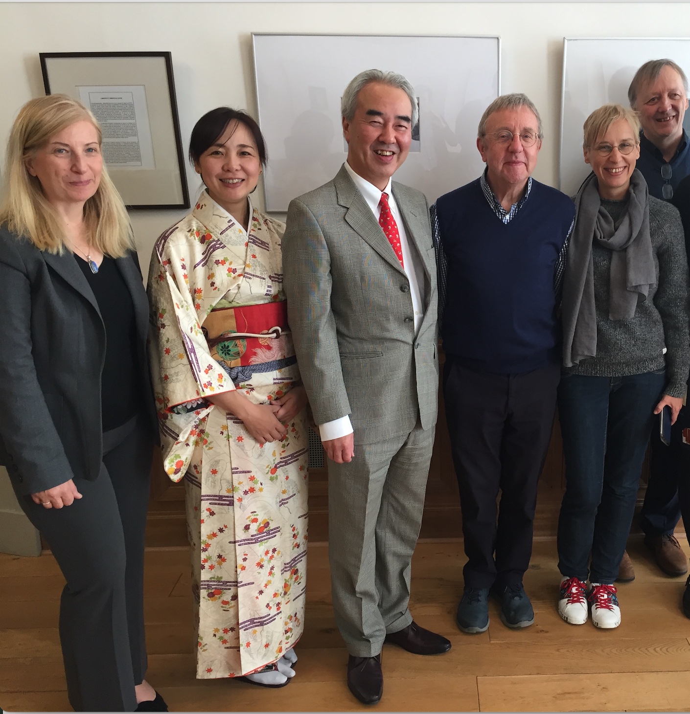 Ramona Fotiade, Saeko Yazaki, the Consul General of Japan, Nozomu Takaoka, Alan Spence, Monika Kocot and Olivier Salazar-Ferrer stand side by side and smile at the camera