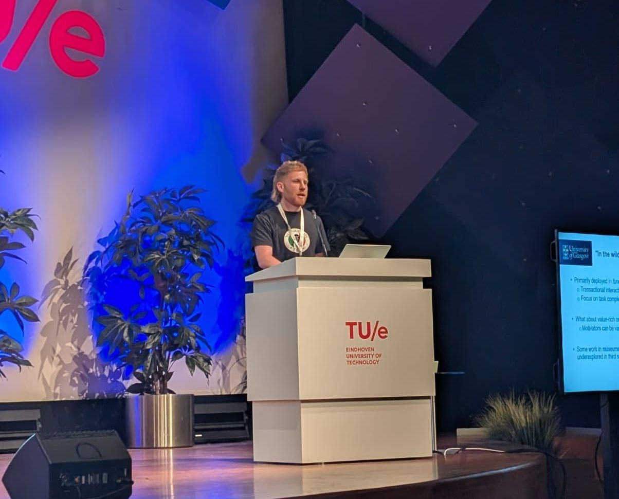 Person standing behind a podium, talking.