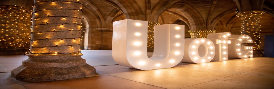 lights in UofG letters in cloisters