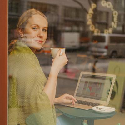 Marketa sitting at a coffee shop