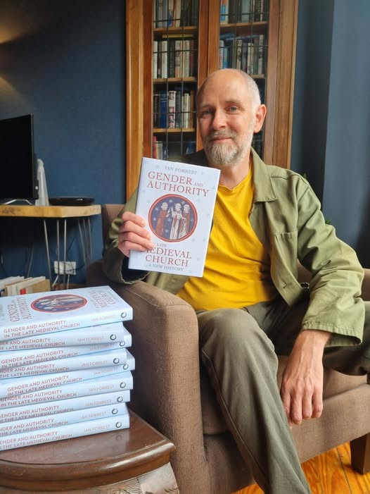 Professor Ian Forrest with his 2025 book Gender & Authority