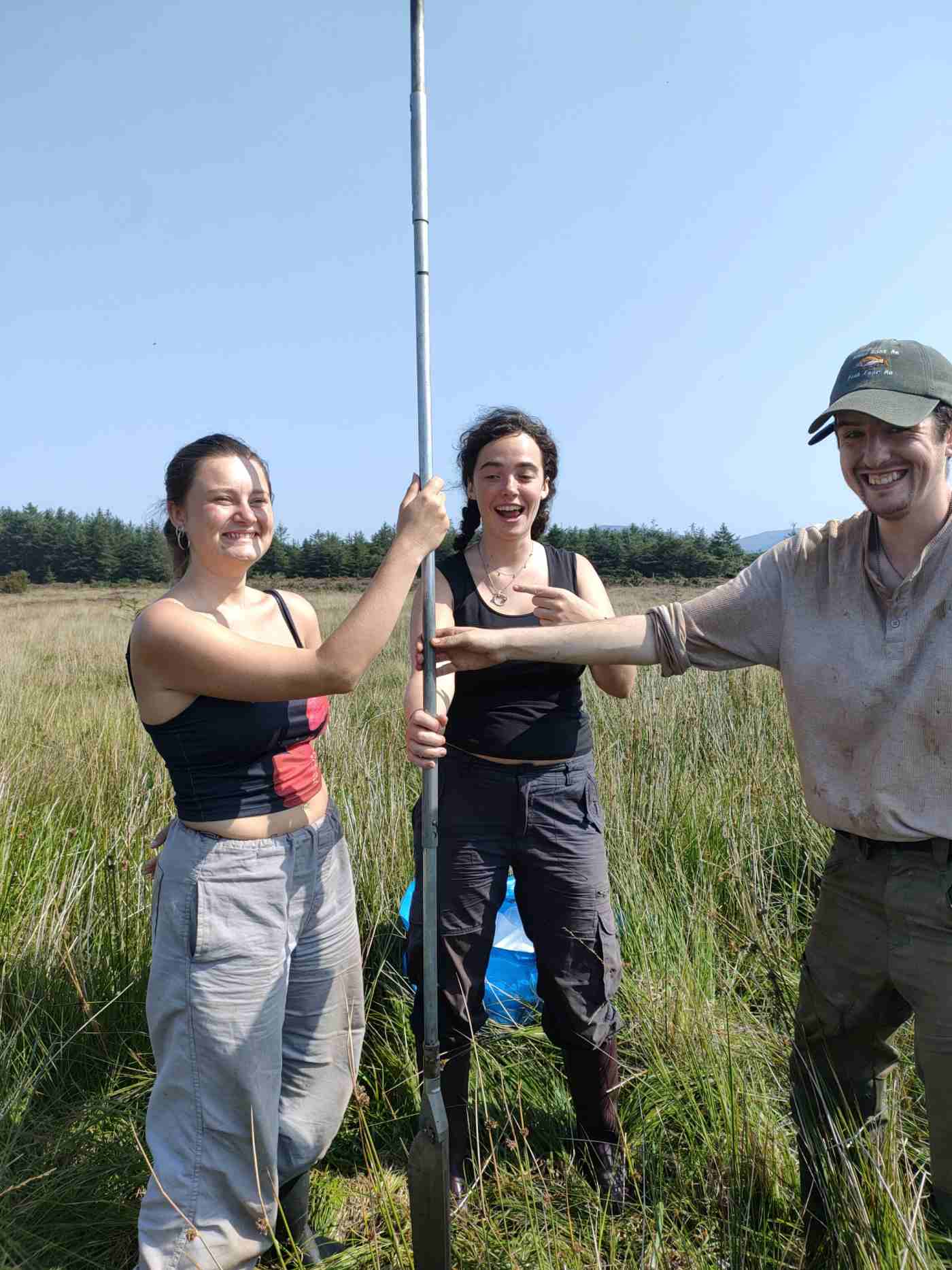 Students coring the Drumadoon peatland with a Russian peat corer, Arran field school, August 2025. Photo credit: N. Whitehouse Students coring the Drumadoon peatland with a Russian peat corer, Arran field school, August 2025. Photo credit N. Whitehouse