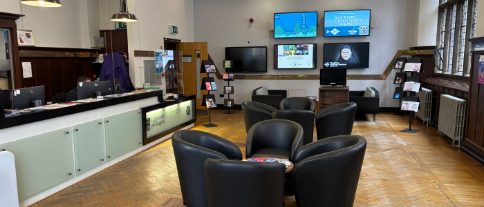 Photo of the SRC Advice Center showing the welcome desk and seating area