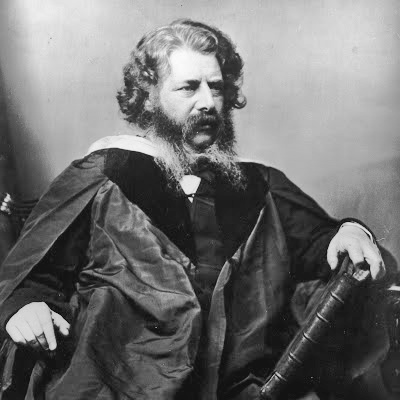 Headshot of William Mcquorn Rankine dressed in an academic gown looking off to the side
