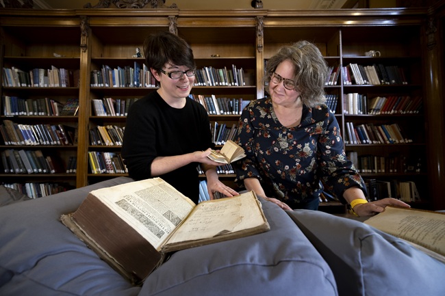 Left to Right: Dr Shanti Graheli and Susan Taylor comparing readers' marks in three of the books which will be on display at the Books ‘Antiques’ Roadshow, part of the Being Human Festival. Credit: Martin Shields Left to Right: Dr Shanti Graheli and Susan Taylor comparing readers' marks in three of the books which will be on display at the Books ‘Antiques’ Roadshow, part of the Being Human Festival. Credit: Martin Shields