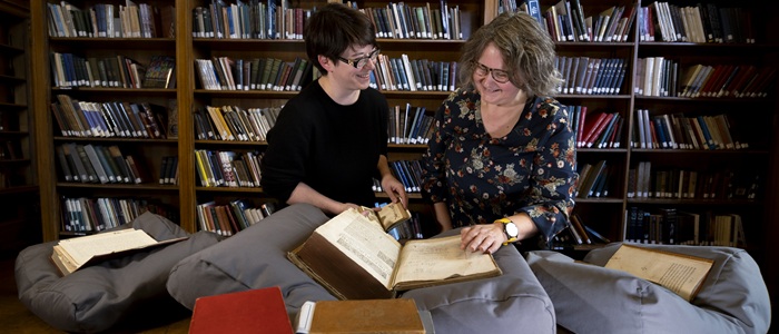 Left to Right: Dr Shanti Graheli and Susan Taylor browsing through a selection of books ahead of the Books ‘Antiques’ Roadshow, part of the Being Human Festival. The community event celebrates the personal and historical value of well-loved pages. Credit: Martin Shields