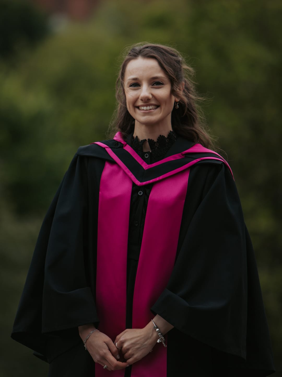 Lauren Black in her PhD gown from the University of Glasgow