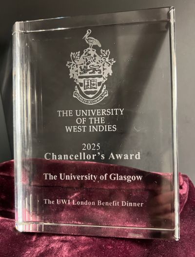A photo of a glass trophy for the University of the West Indies Chancellor's Award   The University of the West Indies Chanellor's Award 2025