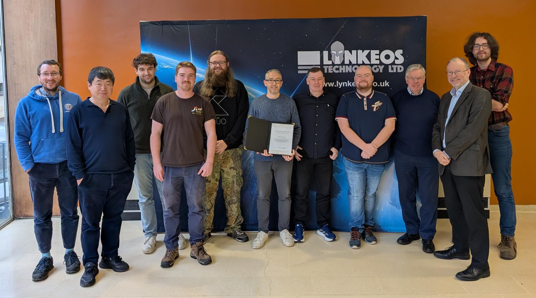 A photograph of the Lynkeos team with their IOP Business Innovation Award