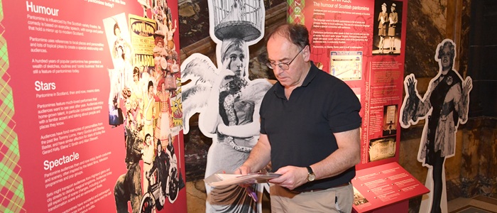 Panto curator Dr Paul Maloney puts finishing touches to City Chambers exhibition