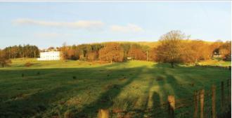 Landscape wide shot taken of Cochno House and farm