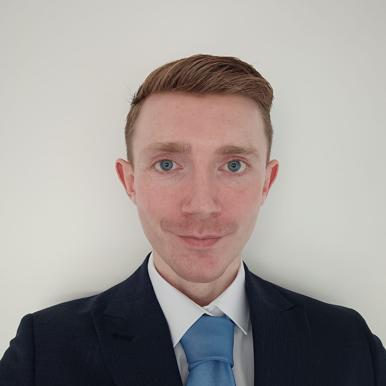 Photo of Paul Smith in a Suit