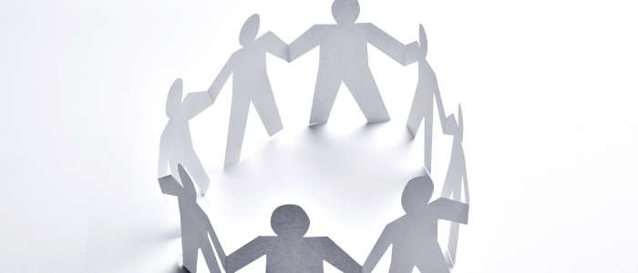 Joined up paper figures in a circle