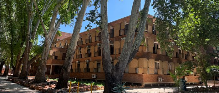 Building housing the pollen lab at NUW with surrounding trees