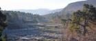 Mar Lodge landscape, showing mountains in the background and a meandering river in the foreground